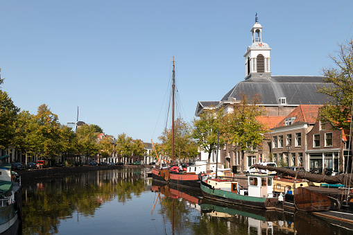 Old harbor in the center of Schiedam with a view of the Saint John the Baptist Church, better known as the Havenkerk, in neoclassical style on De Lange Haven.