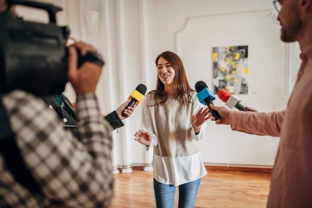 istock Artist talking to the press 1399943515