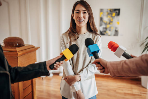 istock Artist talking to the press 1399943528