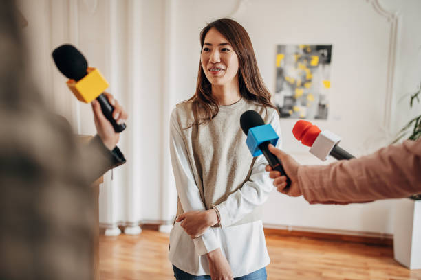 istock Artist talking to the press 1399943567