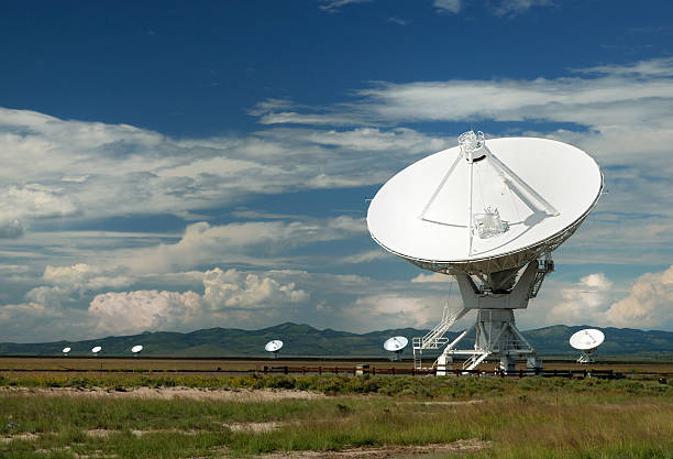 VLA Cluster A series of satellite dishes in the New Mexican desert, used for radio astronomy radio telescope photos stock pictures, royalty-free photos & images