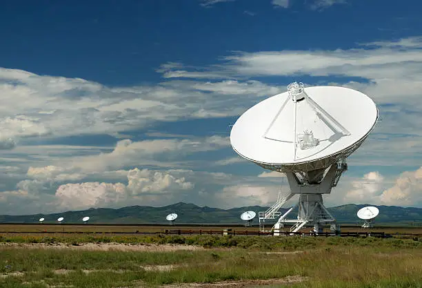 A series of satellite dishes in the New Mexican desert, used for radio astronomy