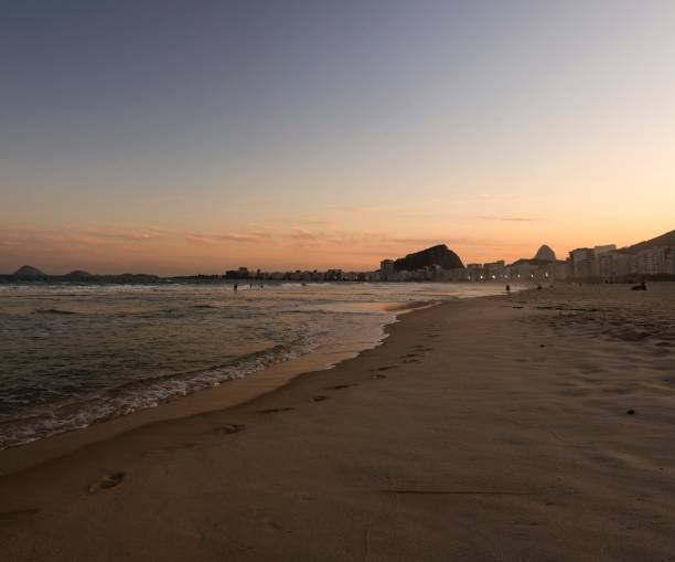 istock Rio de Janeiro, Brazil. Sunset at Copacabana beach. 1399945609