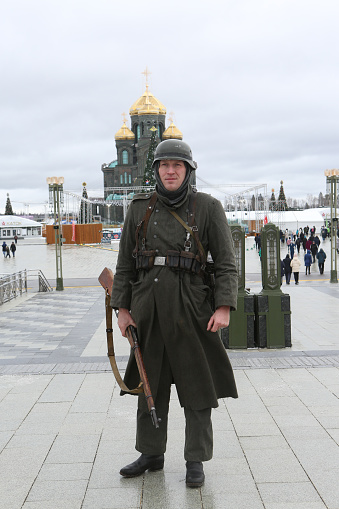 February 23, Defender of the Fatherland Day. Patriot Park in Moscow city, Russia. Military, conscription. Russian Armed Forces, army. Russian soldier in military uniforms of USSR, Great Patriotic War time, clothes.\nPhotographed on Canon EOS 5D Mark III.