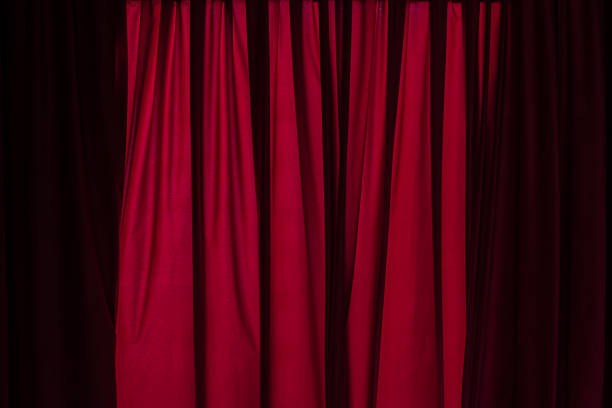 istock Red background, red curtain texture, theater curtain. 1399948901