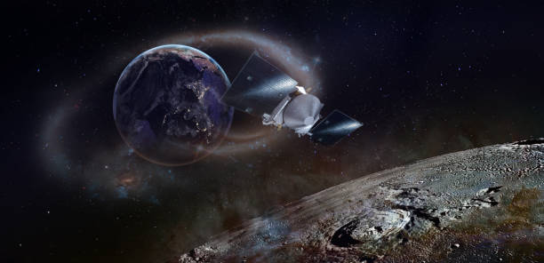 istock Moon surface and planet Earth with spaceship flying around. 1399949017