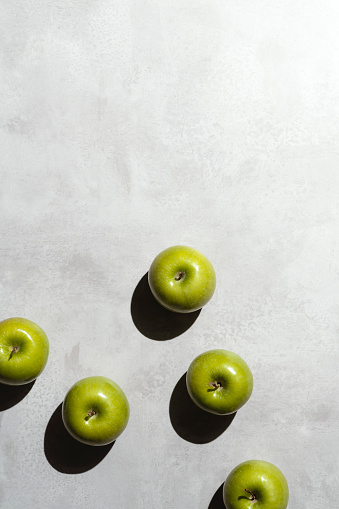 Green apples, directly above, table top shot.