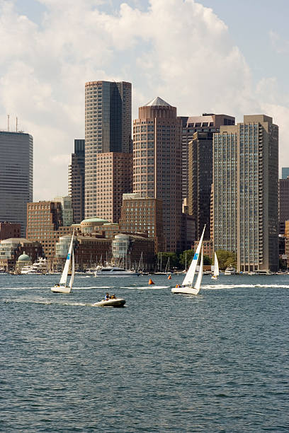 Busy Boston Harbor A warm summer day brings heavy traffic to Boston Harbor. east boston stock pictures, royalty-free photos & images
