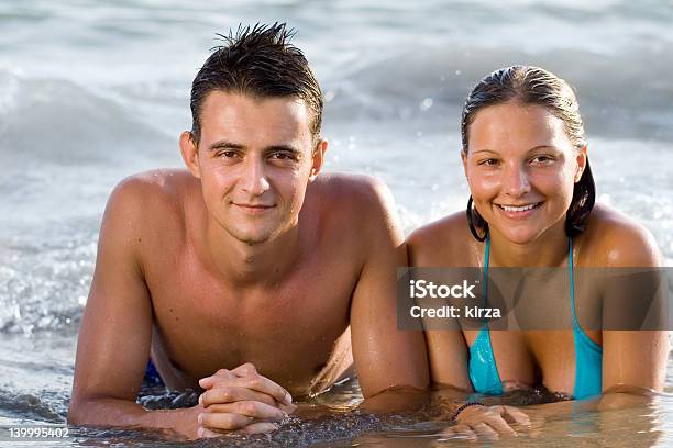 Young Couple Stock Photo - Download Image Now - Adult, Adults Only, Beach