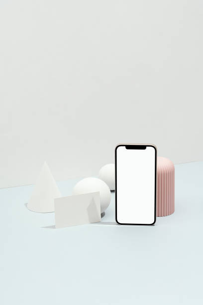 istock Blank white business card and smart phone mockup, template with geometric objects 1399954297