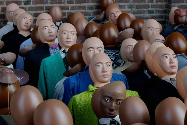 Group of dolls or dummies mimicking a crowd of people
