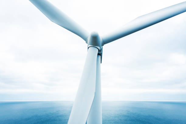 istock Wind turbines at sea 1399957490