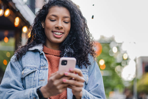 istock Woman texting on her smart phone 1399958218
