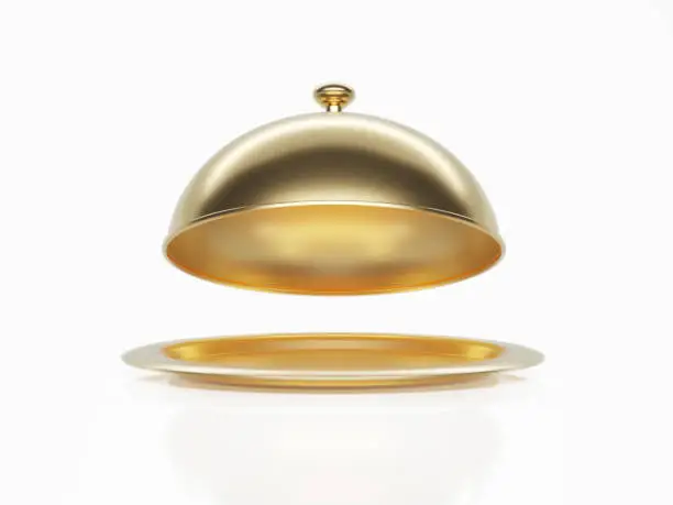 Gold platter sitting on white background. Horizontal composition with copy space. Clipping path is included.