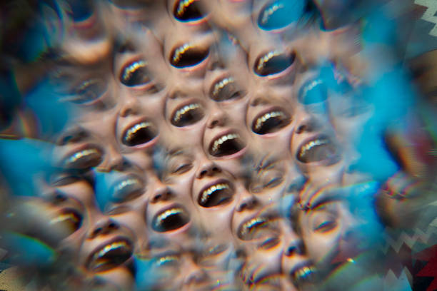 Multiple image of a female laughing portrait with a prism