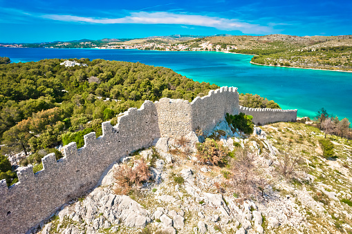 Ostrica historic defence wall ruins in Grebastica bay aerial view, Dalmatia archipelago of Croatia