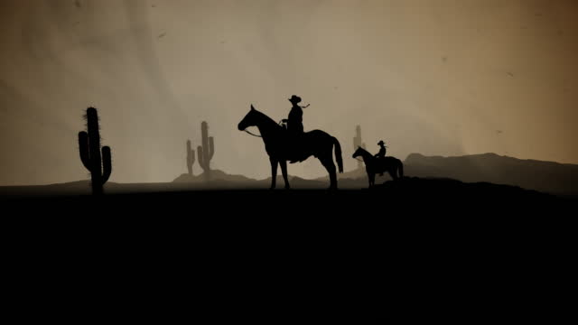 Two Cowboys on Horses in a Desert