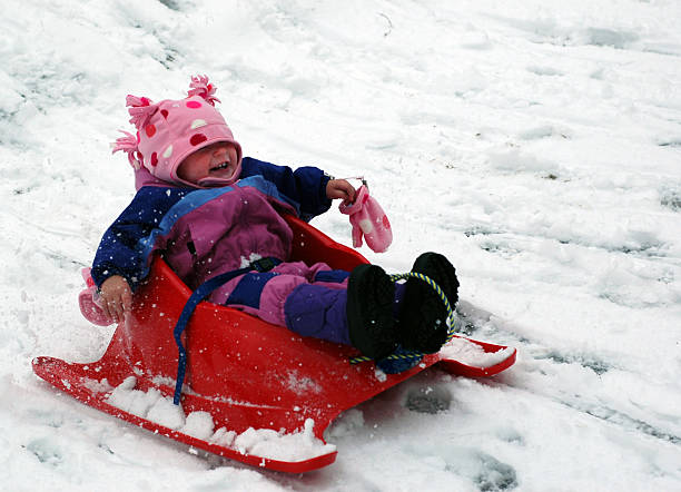 istock Baby sledding for the first time 139996884