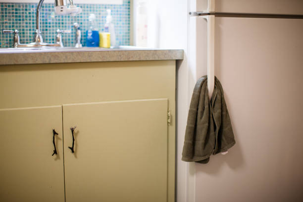 Common household items inside of a home. Things include kitchen items, bedroom details, and decor.