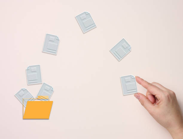 istock Concept of document flow in the company, transition to paperless technology. Electronic document management 1399969406