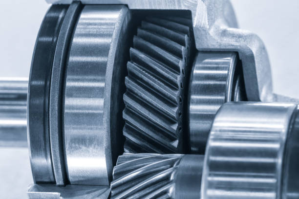 istock gear reducer, Engine gear wheels, industrial concept background 1399971026