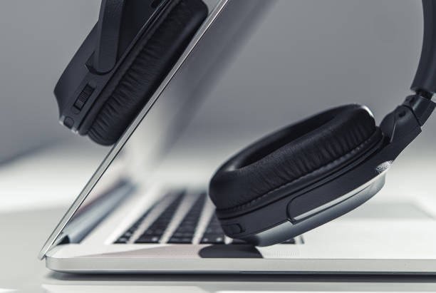 istock Laptop Computer and Professional Headphones Audio Mixing 1399971788