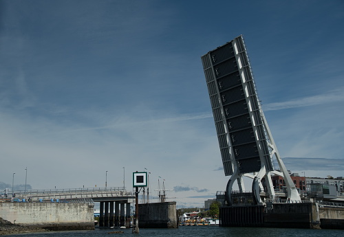 Approaching opened Johnson street bridge from Inner Harbor on a boat, Victoria, British Columbia