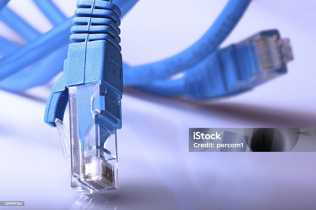 Computer Network Cable Two network rj45 plugins closeup Balance Stock Photo