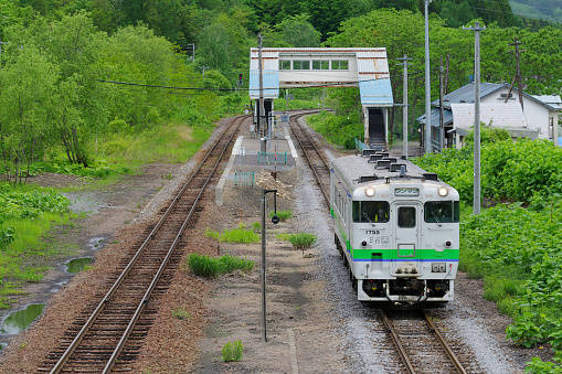 Akabira-city, Hokkaido, Japan - May 29, 2022 : KIHA 40 Local train at the Moshiri station