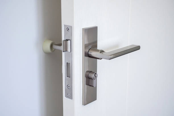 istock Wall mounted door stopper with modern door handle 1399980895