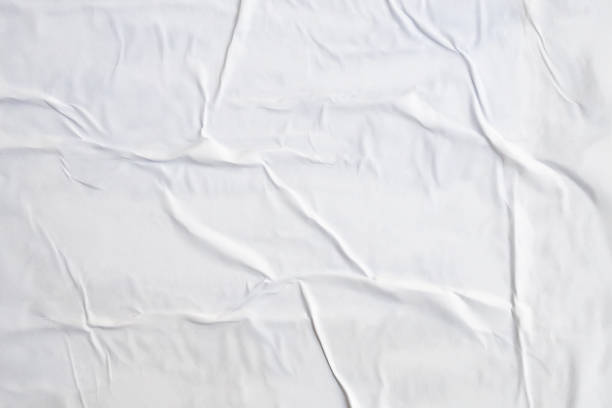 istock white crumpled and creased paper poster texture background 1399981003