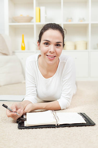 istock Beautiful girl studying at home 139998155