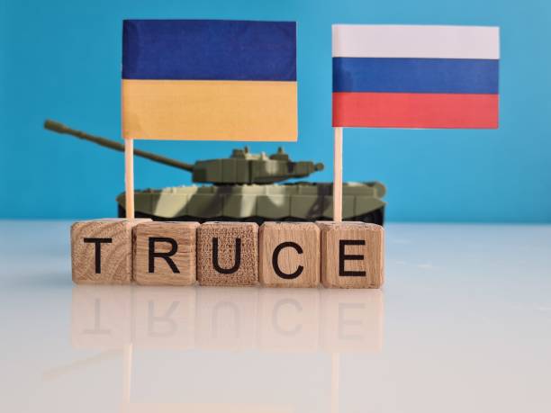 Truce Ukraine Russia military conflict and stop war Truce Ukraine Russia military conflict and stop war. End of war and peaceful life concept truce flag stock pictures, royalty-free photos & images