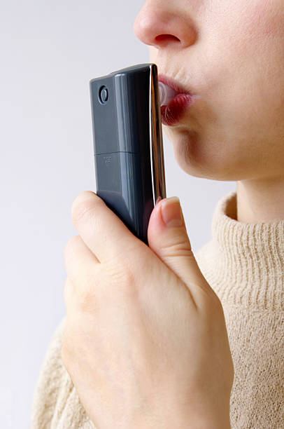 istock Alcoholometer - Women perform a test of alcohol 139998200