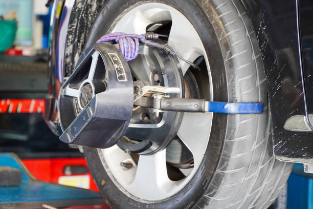 istock Check service, sensors during suspension adjustment, wheel alignment work at the repair station 1399993529