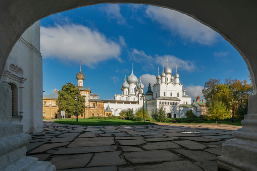 View of the Church of the Resurrection of Christ, the gates to Cathedral Square, the domes of the Assumption Cathedral from Vladychy Dvor of Rostov Kremlin, Rostov the Great, Yaroslavl region, Russia