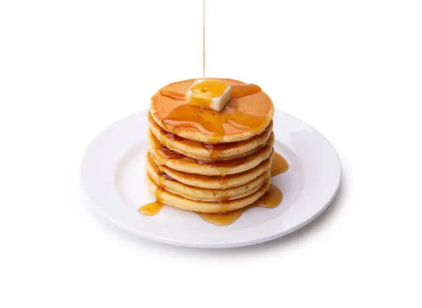 Pancakes with syrup and butter . clipping path.