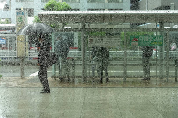 istock Rainy city beyond the screen of raindrops 1399996343