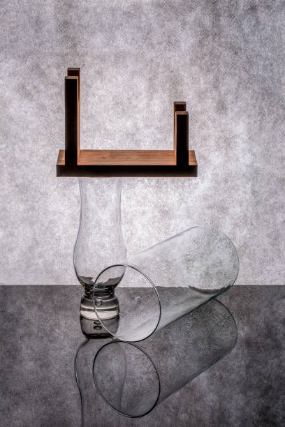 istock Still life with glass objects and a wooden figure 1399998200