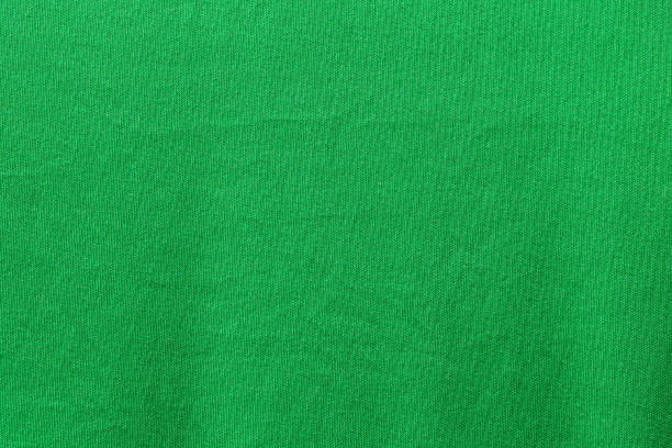 istock Green color fabric cloth polyester texture and textile background. 1400000578