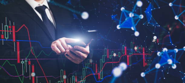 istock Man using smartphone with graphs analysis candle line and foreign currency rate on bokeh colors light. Manager analyzing investment statistics and indicators on dashboard for trading products. 1400003091
