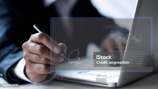 Businessman Use Electronic Pen Sign Signature On Electronic Esigning Data Sheet Document Management Paperless Office Concept Businessman Using Stylus Pen Signing E Document On Digital Tablet Stock Photo - Download Image Now