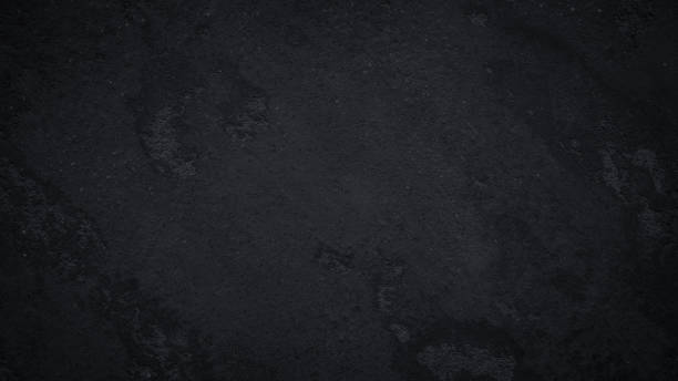 istock Black or dark gray grainy concrete texture background 1400004087