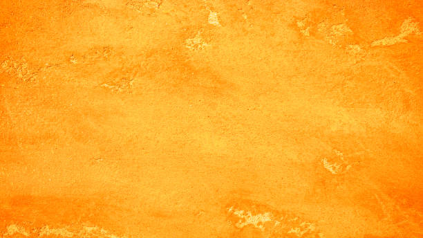 istock Orange and yellow rough grainy stone texture background 1400004093