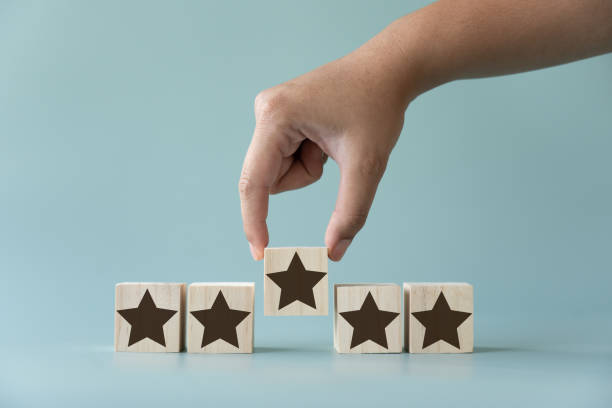 istock Customer review concept picking five stars for great service experience. 1400010289