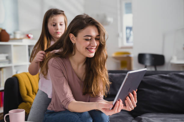 istock mother and daughter at home 1400010761
