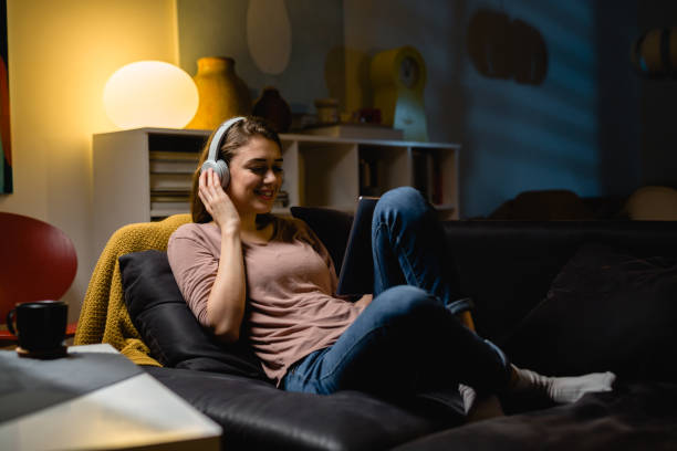 istock woman relaxing at home 1400010793