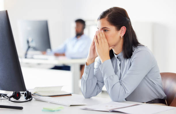 istock One anxious caucasian businesswoman feeling pressure and panic while making mistakes on a computer in an office. Young overworked and exhausted entrepreneur worried about deadlines. Mentally frustrated with burnout and stress 1400010800