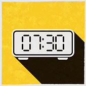 Icon of "Digital clock" in a trendy vintage style. Beautiful retro illustration with old textured yellow paper and a black long shadow (colors used: yellow, white and black). Vector Illustration (EPS10, well layered and grouped). Easy to edit, manipulate, resize or colorize. Vector and Jpeg file of different sizes.