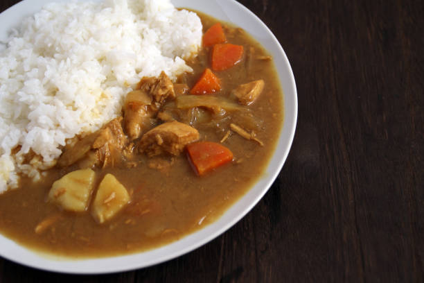 istock Curry rice served at a restaurant with a wooden table 1400020003